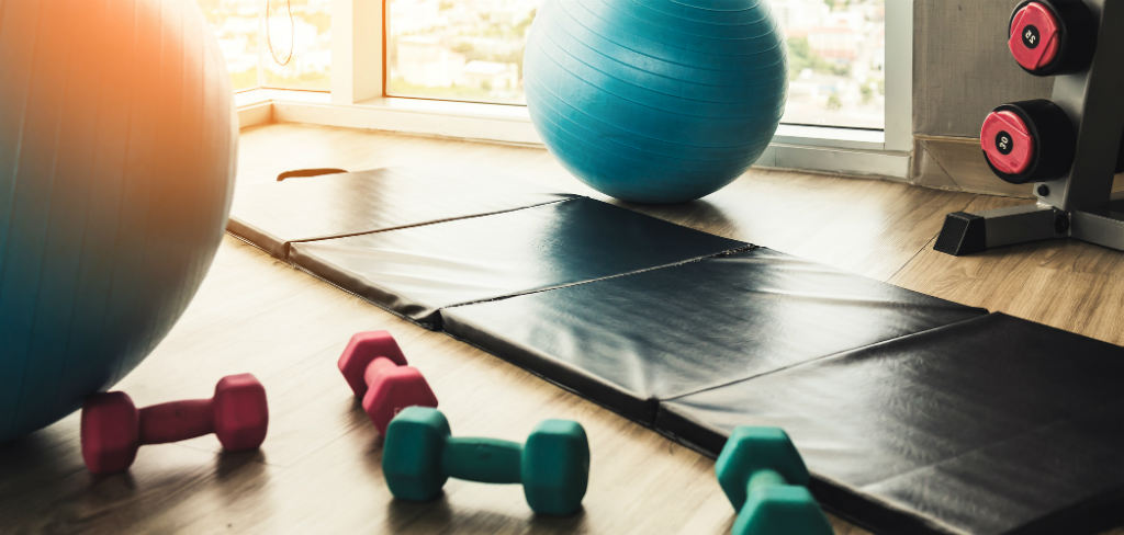 Spacious gymnasium with various fitness equipment neatly arranged.