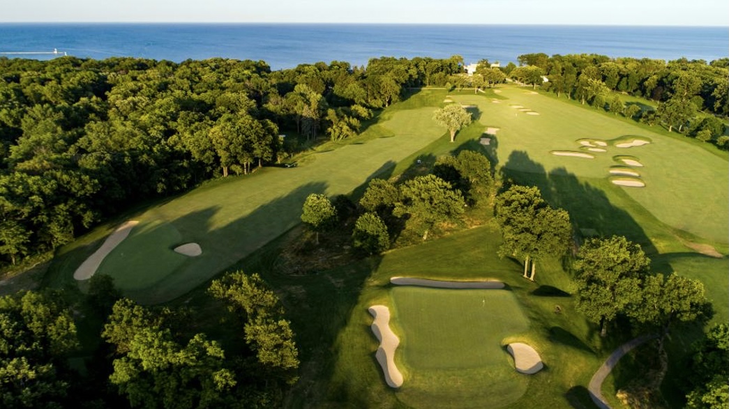 Golf course with green grass