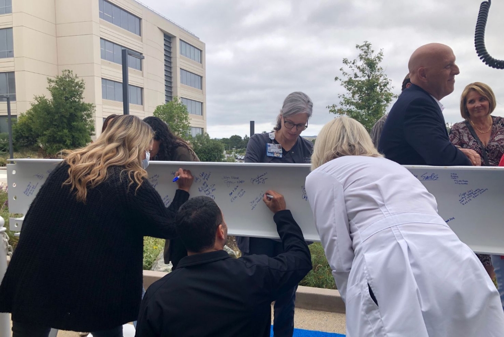 Building Hope: Hospital beam-signing marks a milestone for City of Hope Orange County