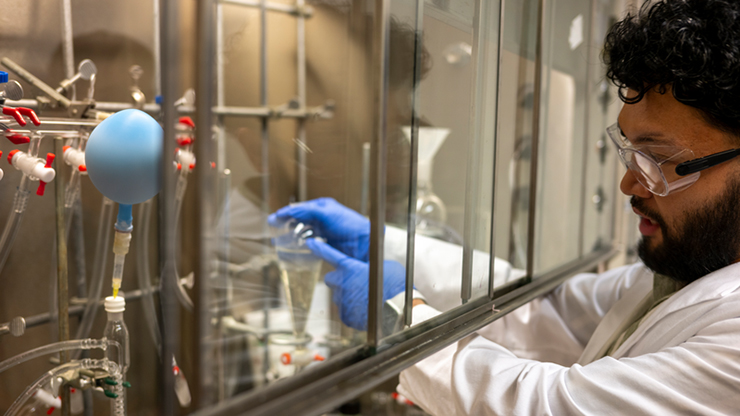 Postdoctoral fellow Alon Agua conducts research in the laboratory. 