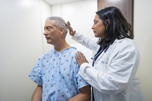 Patient undergoes an exam in City of Hope's mobile cancer prevention and screening clinic