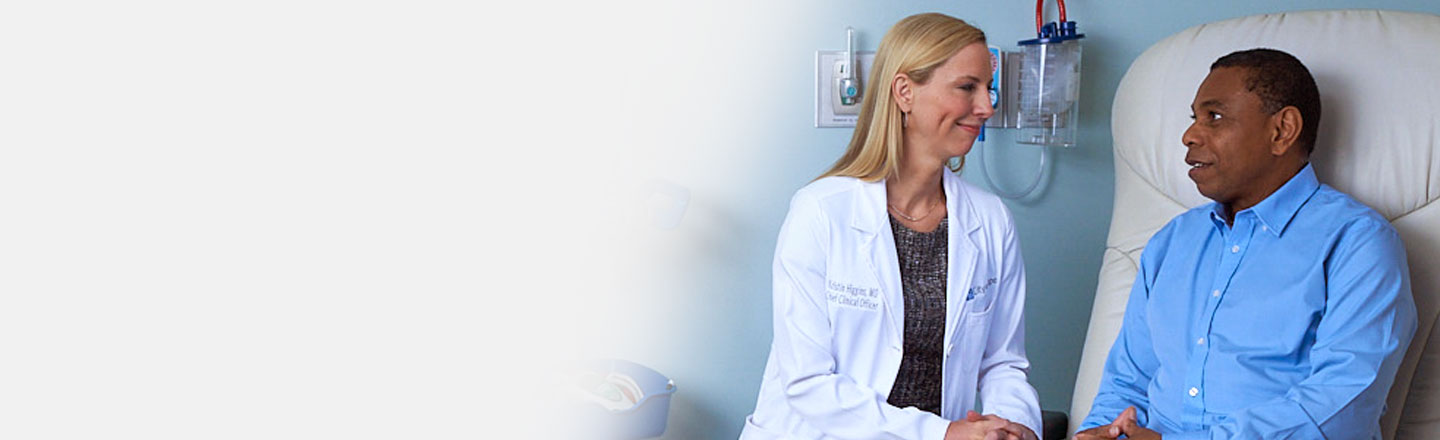 Doctors consulting patient in examination room