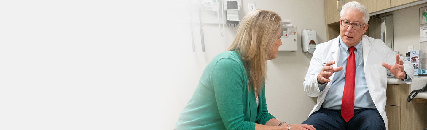 City of Hope doctor consulting patient at Chicago Cancer Center