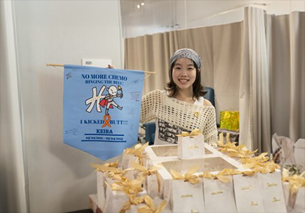 Patient, Keira Chang, celebrating after completing chemotherapy
