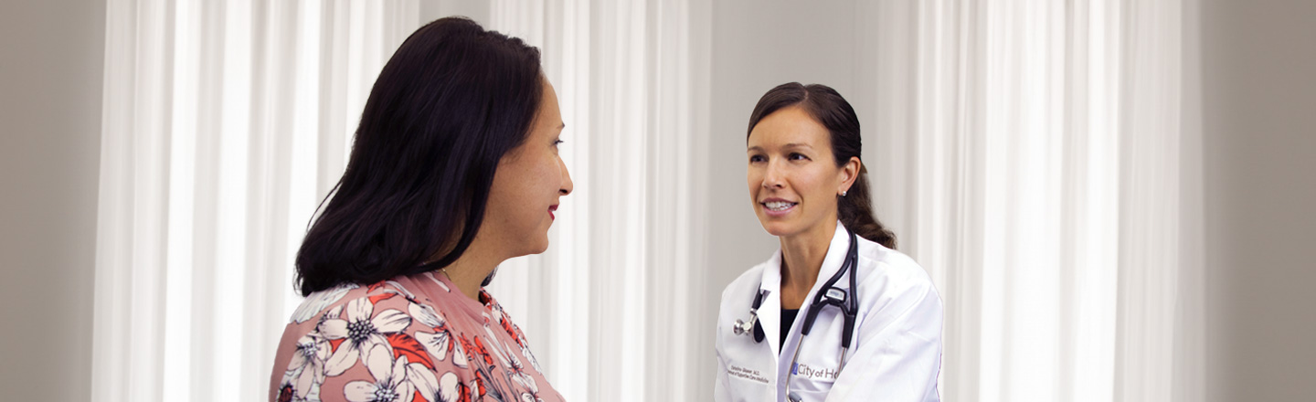 Dr. Christine Glaser meeting with her patient