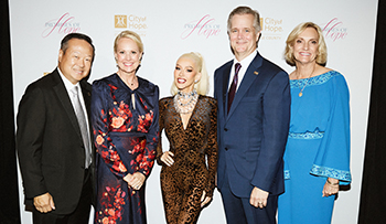 Photo of City of Hope leadership with Christina Aguilera