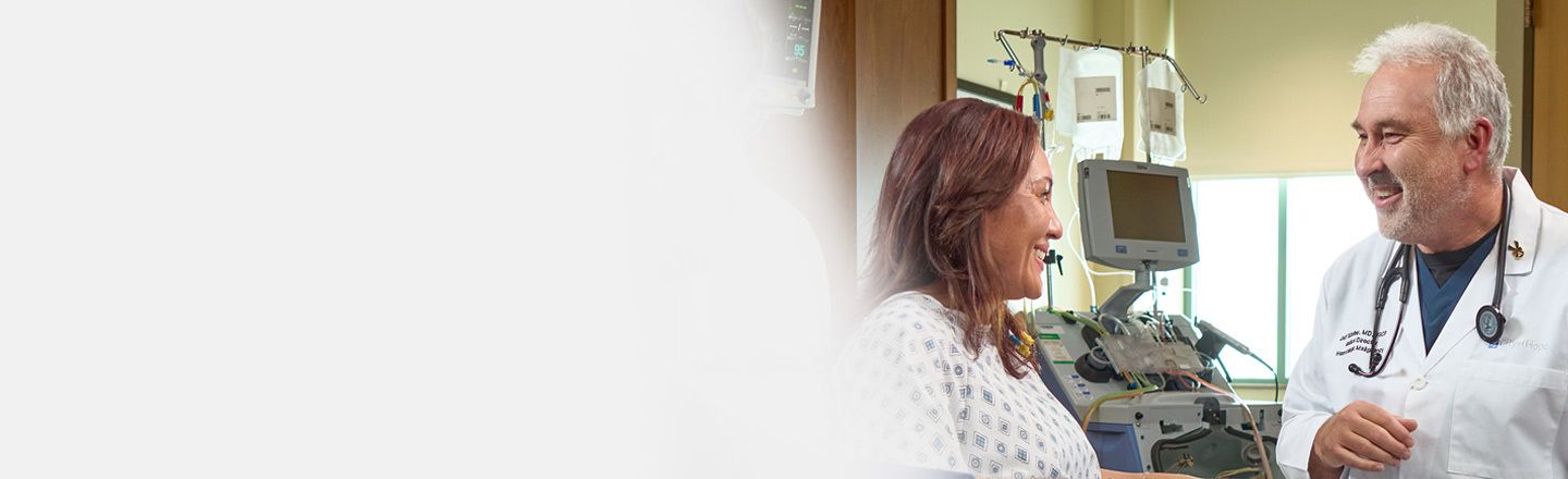 City of Hope doctor consulting patient at Phoenix Cancer Center