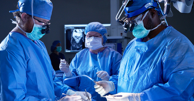 Surgeons operating