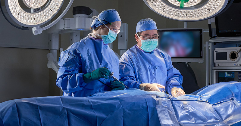 Surgeons operating