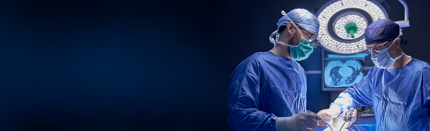 Doctors looking at cancer on computer in Atlanta Lung Cancer Center