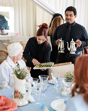 Grateful patients enjoy tea at Beauty in Hope event