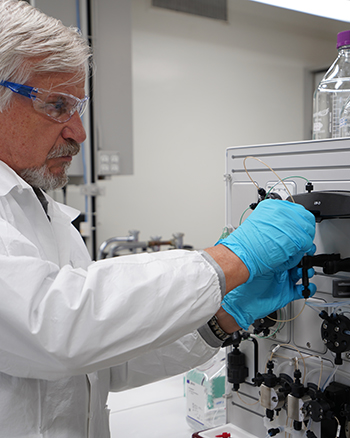 Grateful patient Sergei at work in the lab