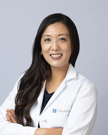 Breast surgeon Jennifer Tseng, M.D., against a grey background