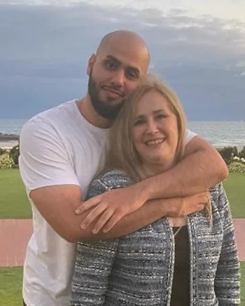 Gynecologic cancer patient Faten Alsafadi and son Donatello at sunset