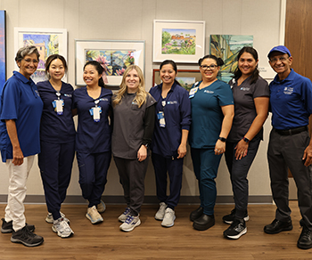 Orange County volunteers Parizad and Seth with their care team