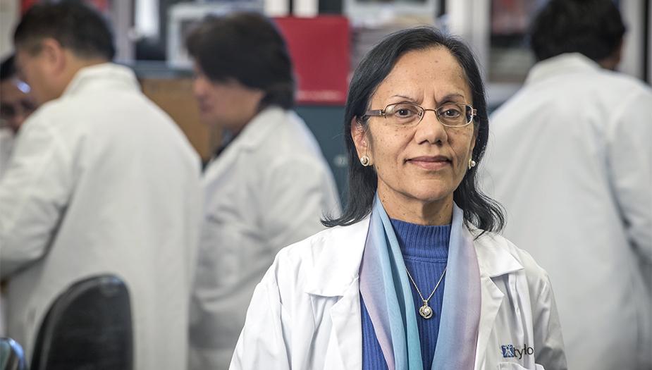 Dr. Rama Natarajan with team in the lab