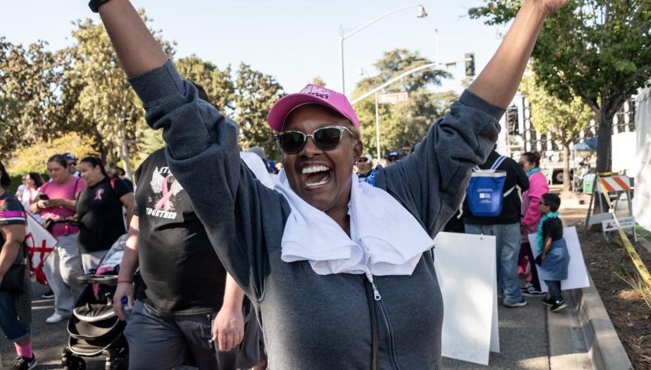 Woman cheering as she participates in Walk for Hope Woman cheering as she participates in Walk for Hope