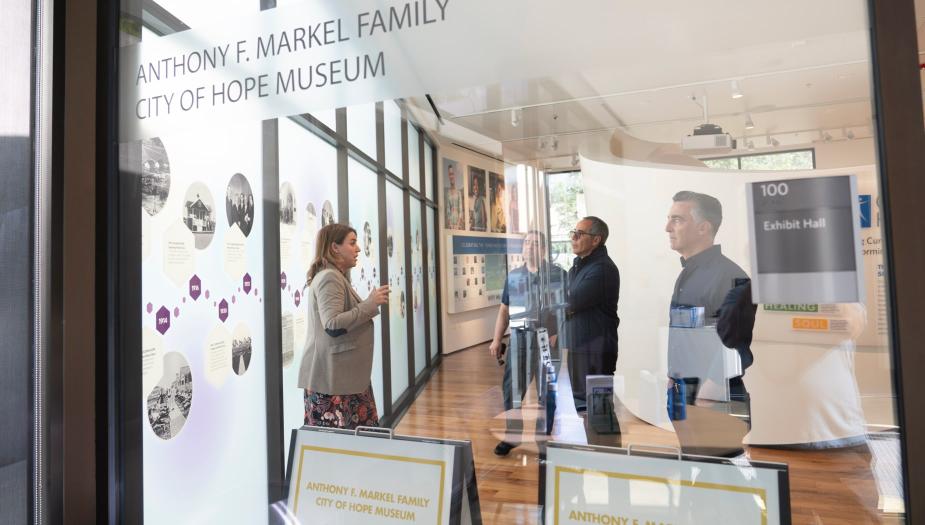Visitors touring the Anthony F. Markel Family City of Hope Museum Exhibit Hall