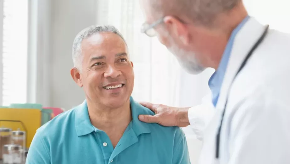 Doctor talking to a patient in the office