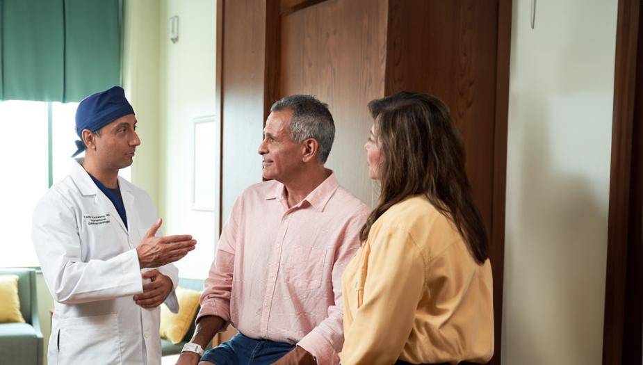 doctor consulting patient and family