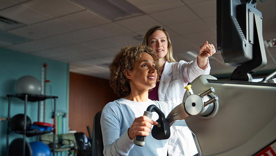 Doctor explaining information on a screen to a patient