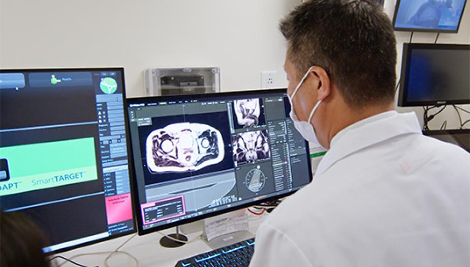 Dr. Percy Lee reviewing patient scans