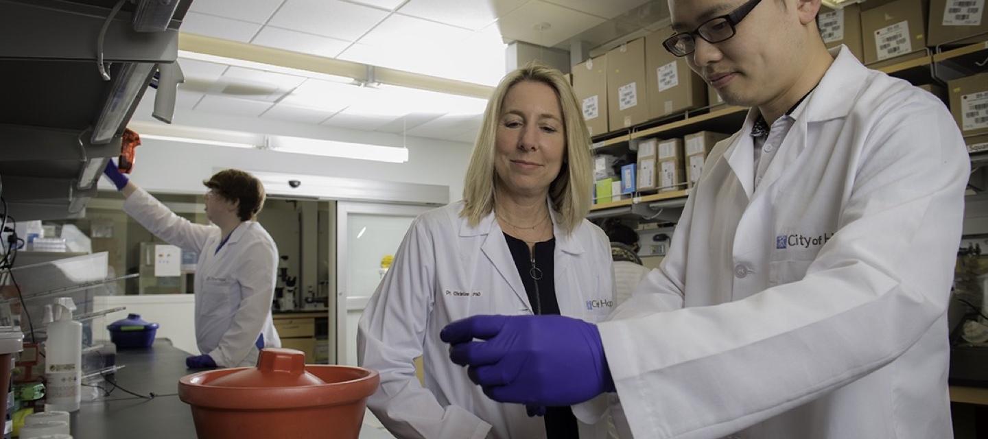 Christine Brown Lab White Coat Pipette