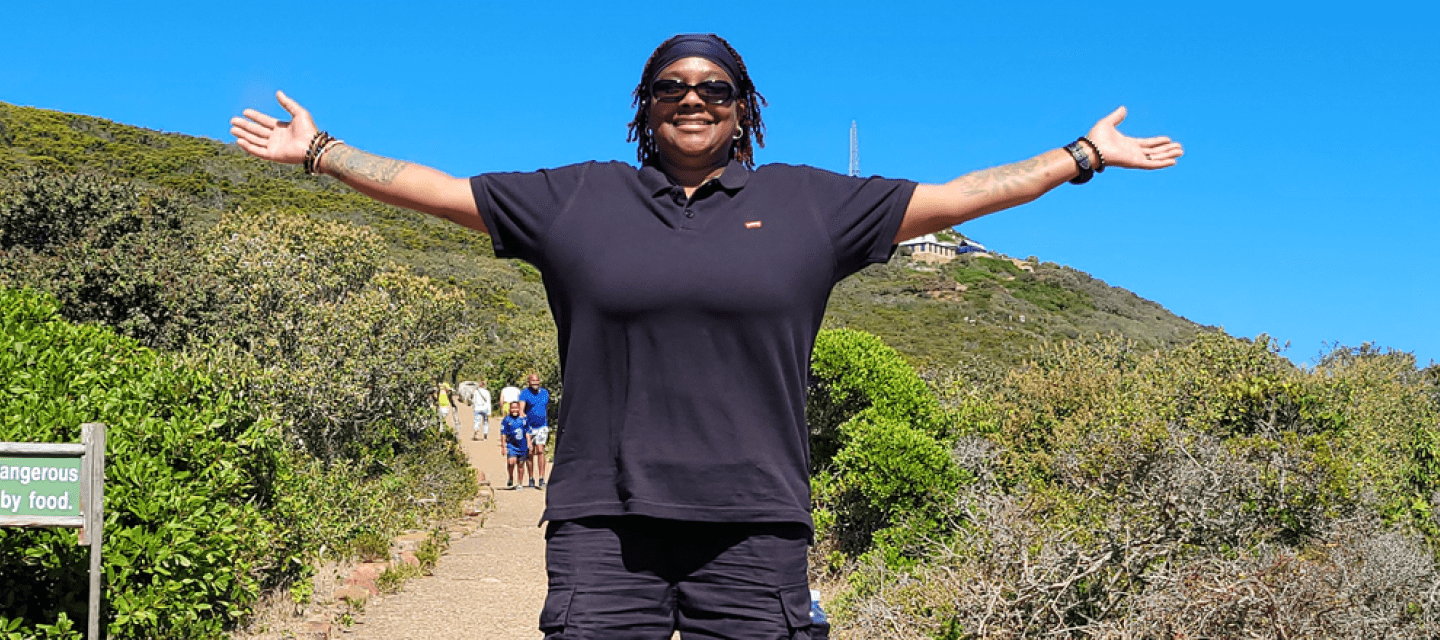 Lung Cancer Survivor Devonne Swift enjoying the outdoors with open arms