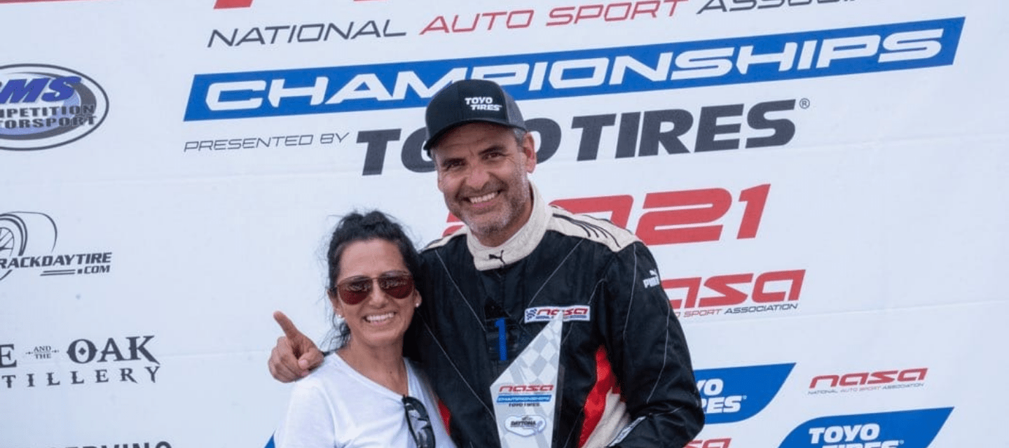 City of Hope patient Marcelo Vine at a car race