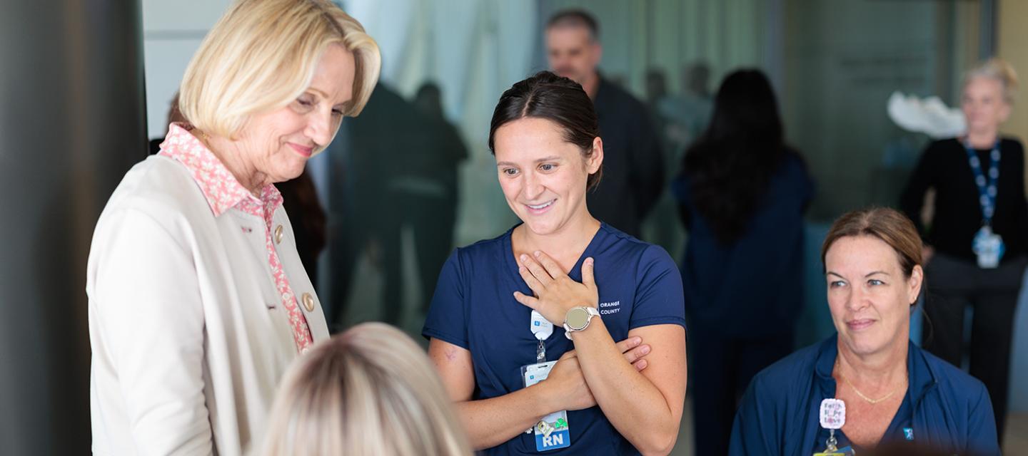 Annette Walker, grateful patient and nurses at Beauty in Hope event