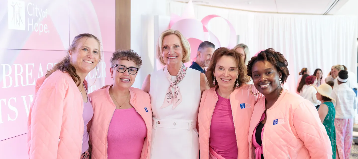 Annette Walker with grateful patients at Breast Cancer Awareness Month celebration