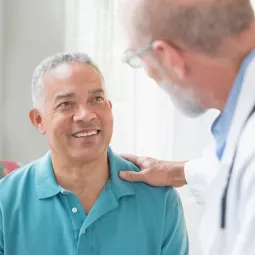 Doctor talking to a patient in the office