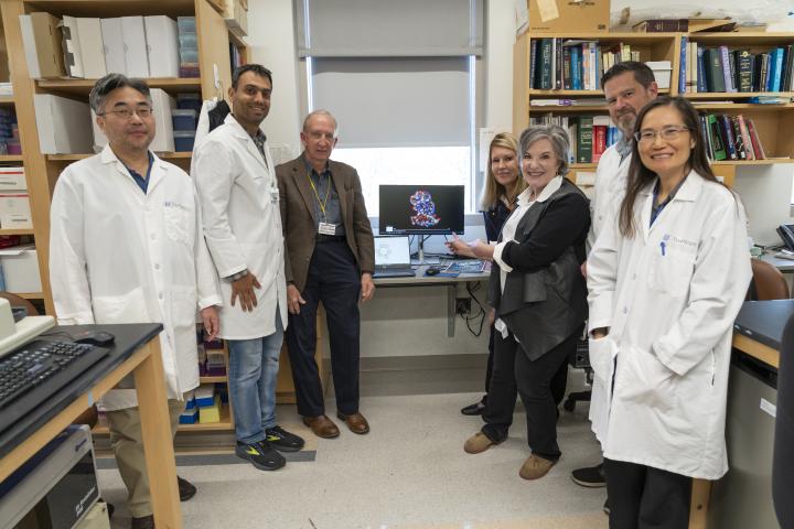 Gail Grimmett visits lab of Dr. Malkas