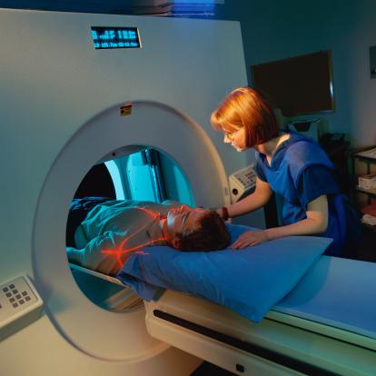 CAT scan of man and woman nurse - small low res