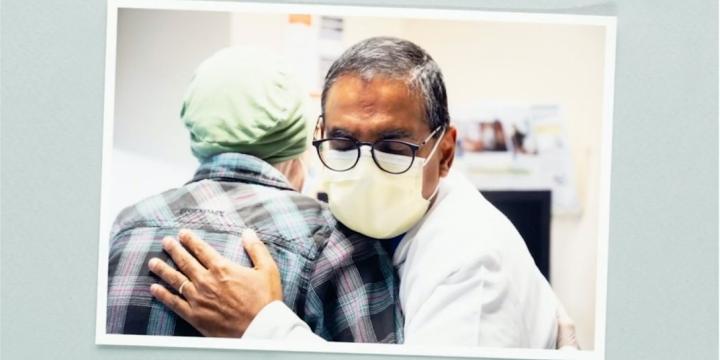 Doctor hugging patient