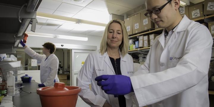 Christine Brown Lab White Coat Pipette