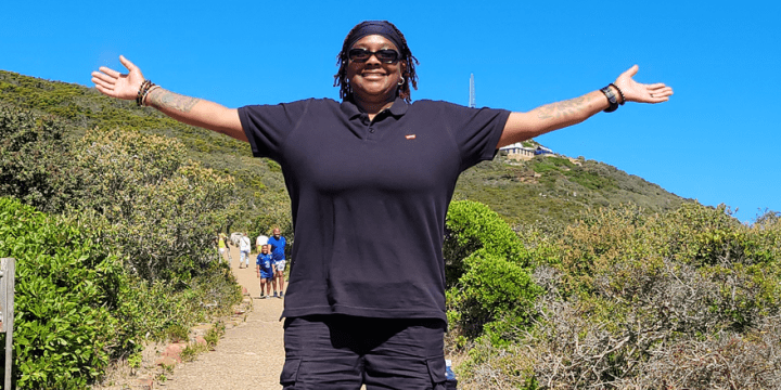 Lung Cancer Survivor Devonne Swift enjoying the outdoors with open arms