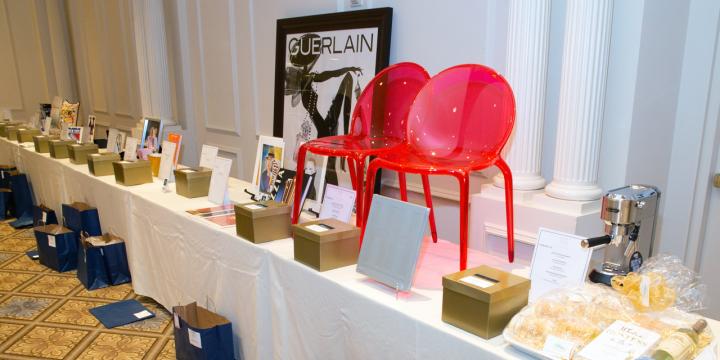 Auction table espresso machine and red acrylic chairs