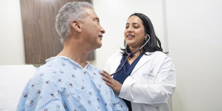 doctor examining patient