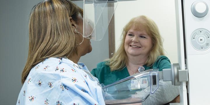 nurse examining patient