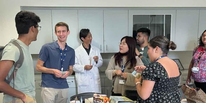 A lab meeting at the Yun Rose Li lab