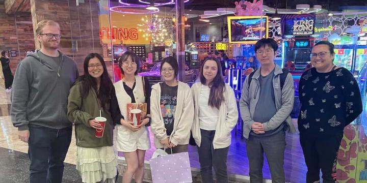 Members of the Yun Rose Li lab at movie night