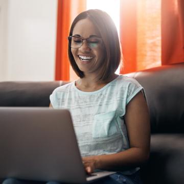 woman using a laptop at home