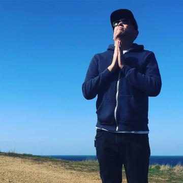 Ian MacLeod in prayer pose