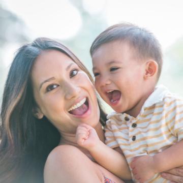 Heather Javier holding a child