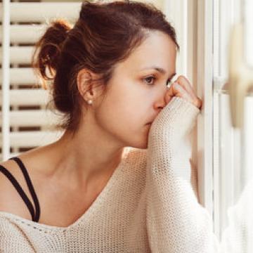 Woman sitting by herself