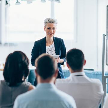 woman leading a seminar