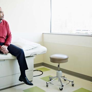 Black patient in hospital room