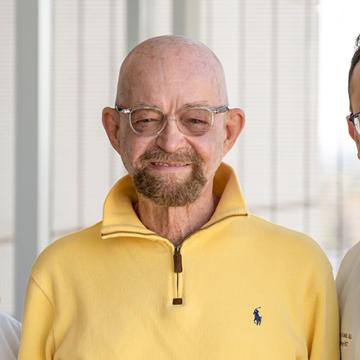 City of Hope patient Paul Edmonds with Dr. Dickter and Dr. Al Malki