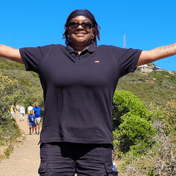 Lung Cancer Survivor Devonne Swift enjoying the outdoors with open arms